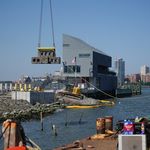 A photo of the Billion Oyster Project installing thousands of baby oysters off the Manhattan coast